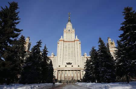 People walk outside the main building of Moscow State University in Moscow February 10, 2015. REUTERS/Sergei Karpukhin