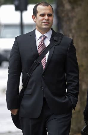 Former Barclay's trader Alex Pabon arrives at Westminster Magistrates Court in London May 27, 2014. Pabon is charged with conspiracy to defraud in connection with the Serious Fraud Office's (SFO) Libor inquiry. REUTERS/Luke MacGregor
