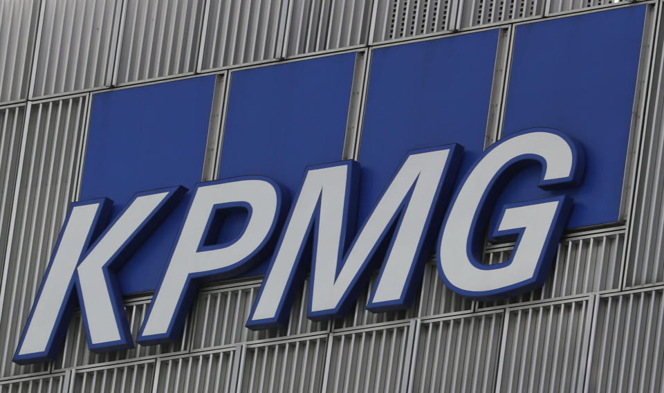 The KPMG logo is seen at their offices at Canary Wharf financial district in London,Britain, March 3, 2016.  REUTERS/Reinhard Krause