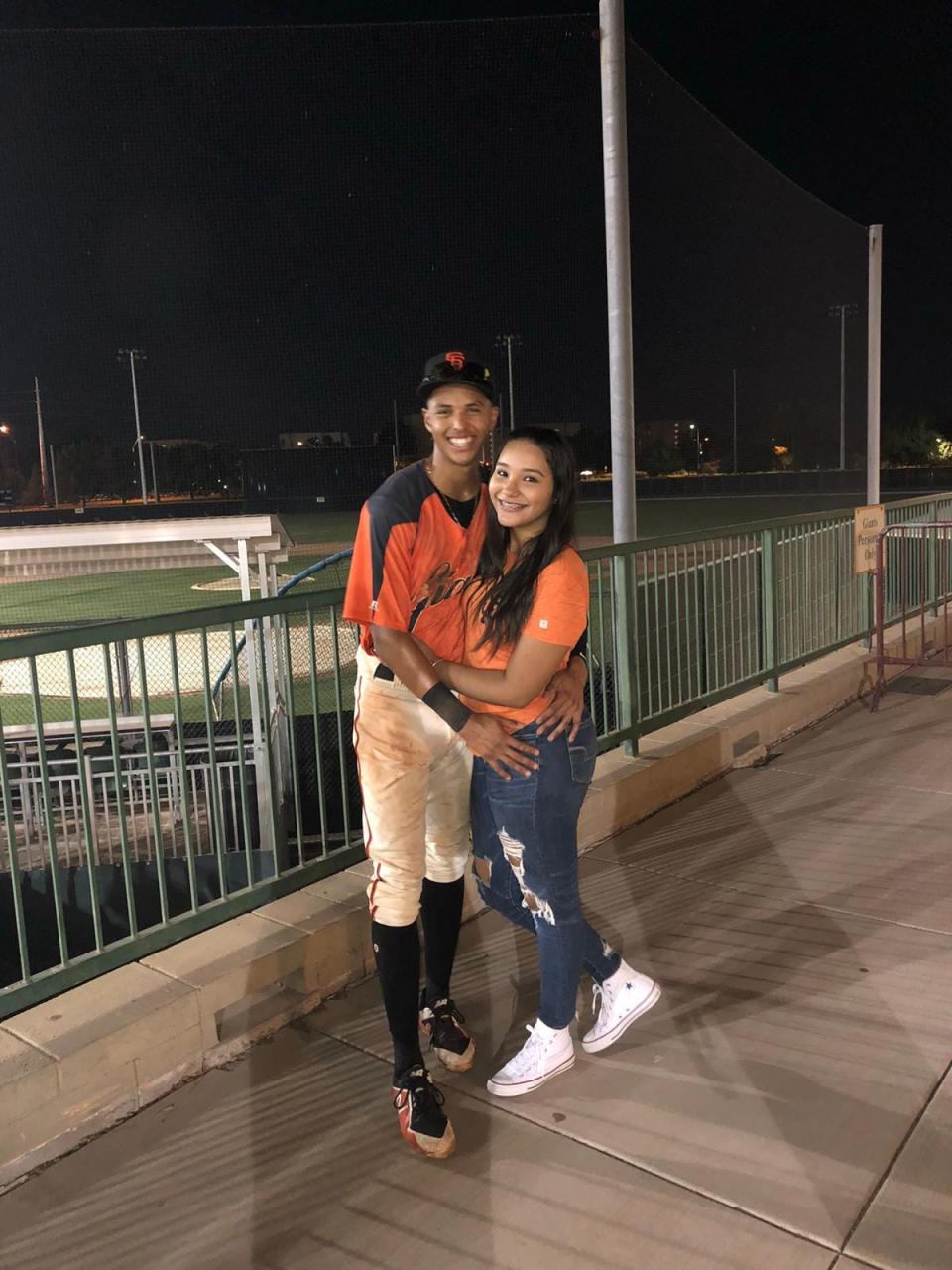 Edison Mora and his girlfriend, Laura Torres after he played a baseball game in the Arizona League.