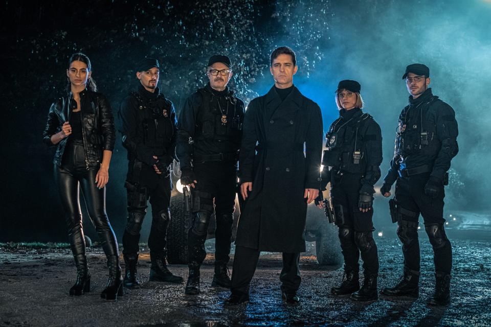 (From left) Begona Vargas as Cameron, Joel Sanchez as Bruce, Tristán Ulloa as Damián Vázquez, Pedro Alonso as Berlín, Michelle Jenner as Keila, Julio Peña as Roi in Netflix's "Berlin."