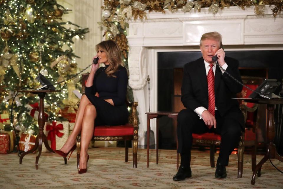 <p>Soft velvet Christian Louboutin pumps paired with this dark dress give this look a luxurious finish. The First Lady wore this sleek ensemble back in December 2018 to assist with the seasonal Santa Tracker at the White House.</p>