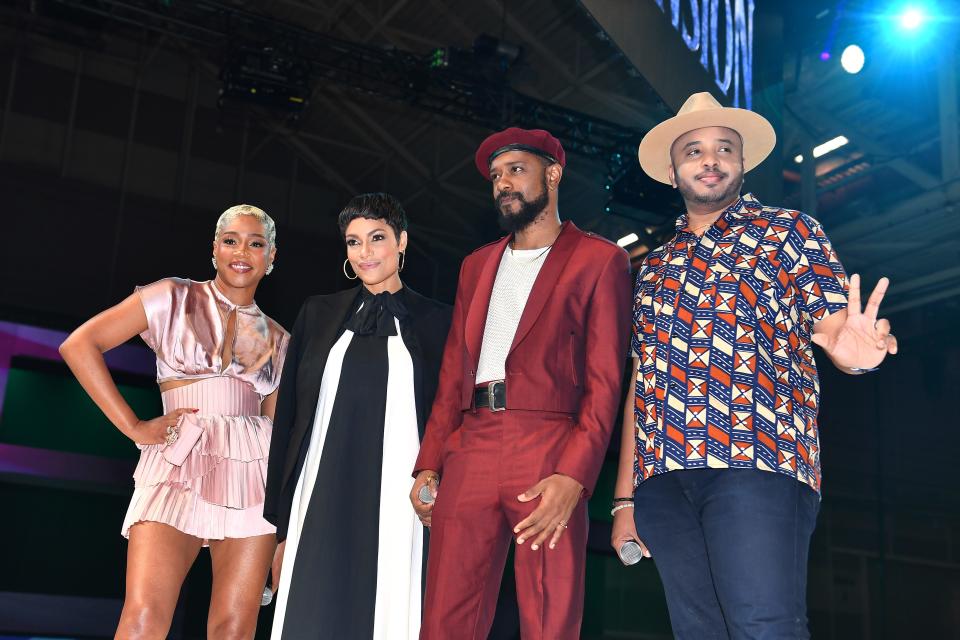 Tiffany Haddish, left, Rosario Dawson, LaKeith Stanfield, and "Haunted Mansion" director Justin Simien at Essence festival in New Orleans earlier this month.