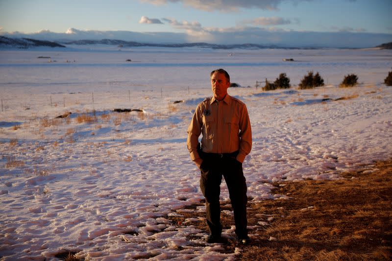 Manager and co-founder of Fortitude Ranch Miller poses for a portrait at his survival camp