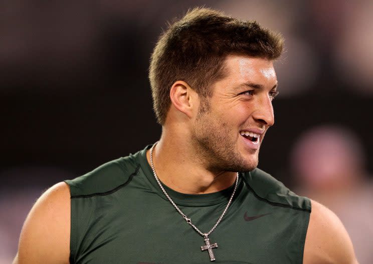 EAST RUTHERFORD, NJ - OCTOBER 08: Tim Tebow #15 of the New York Jets looks on as he warms up against the Houston Texans at MetLife Stadium on October 8, 2012 in East Rutherford, New Jersey. (Photo by Alex Trautwig/Getty Images)