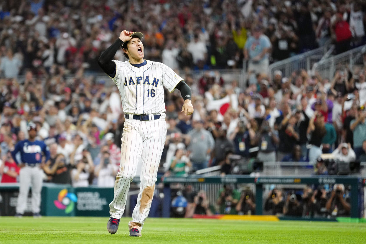 Shohei Ohtani threw his cap and glove after striking out Mike Trout for the final out of the 2023 World Baseball Classic. (Photo by Mary DeCicco/WBCI/MLB Photos via Getty Images)