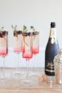 <p>Nothing says "celebration" like gold sugar-rimmed stemware and blackberry garnish. </p><p><strong>Get the recipe at <a rel="nofollow noopener" href="http://theeffortlesschic.com/cocktail-hour-blackberry-thyme-sparkler/" target="_blank" data-ylk="slk:The Effortless Chic;elm:context_link;itc:0;sec:content-canvas" class="link ">The Effortless Chic</a>.</strong></p>