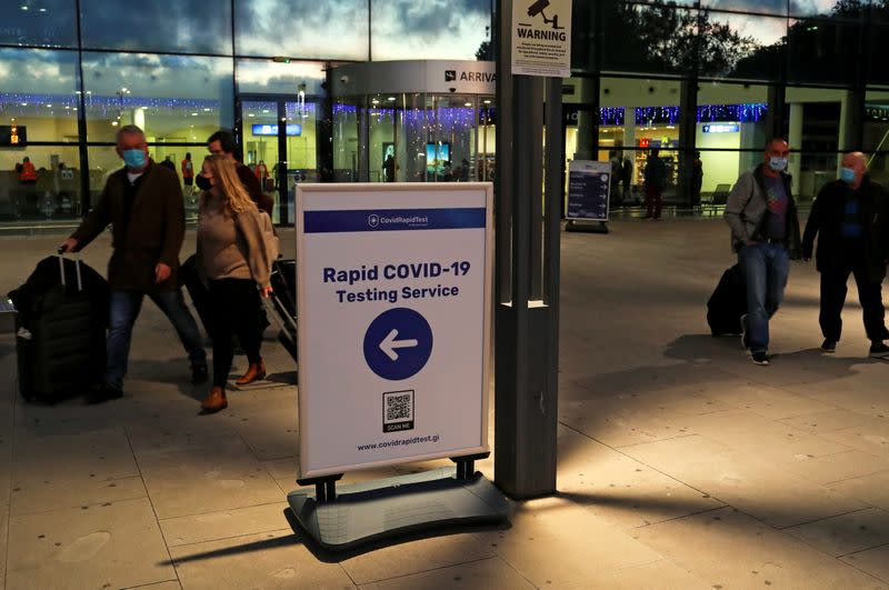 FILE PHOTO: Passengers walk out of the Gibraltar International Airport