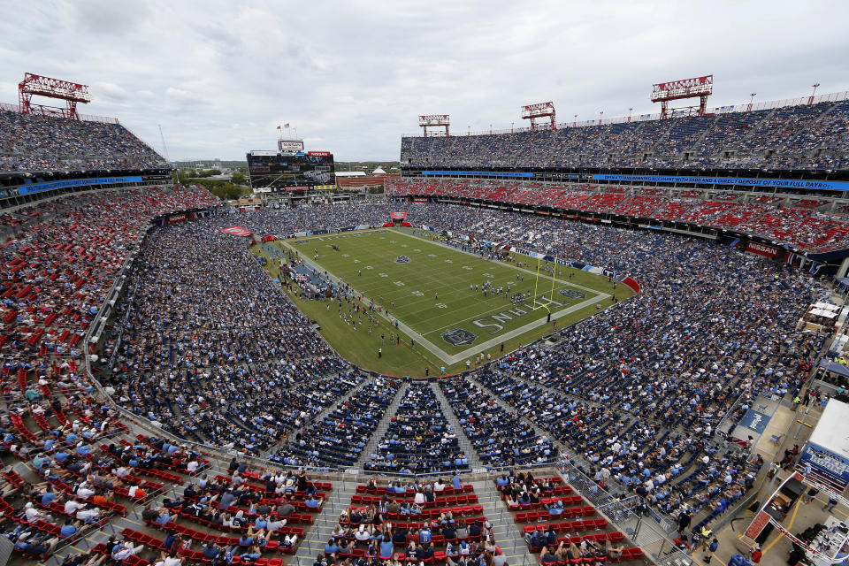 FILE - The Tennessee Titans play an NFL football game against the Houston Texans at Nissan Stadium in Nashville, Tenn., Sept. 16, 2018. Proposals for new and improved sports stadiums are proliferating across the U.S. — and could come with a hefty price tag for taxpayers. The Titans new $2.1 billion domed stadium includes $760 million in local bonds the Nashville City Council approved to go with $500 million in state bonds.(AP Photo/James Kenney, File)