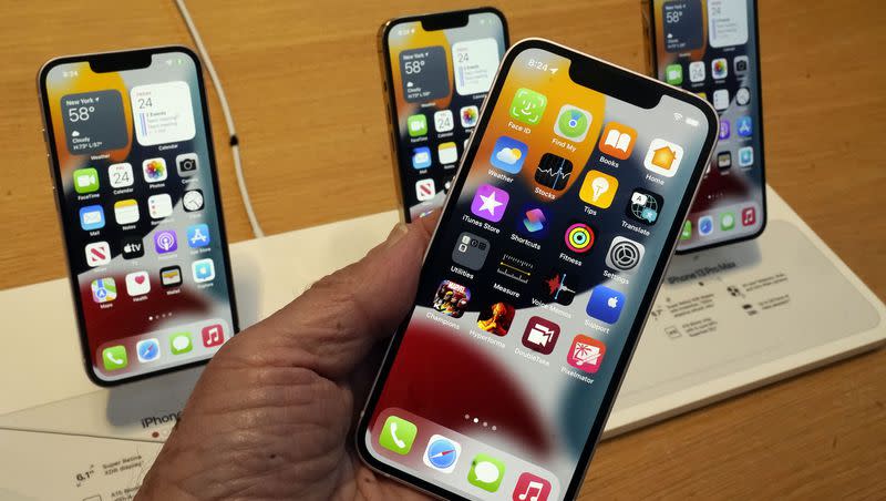 The lineup of the Apple iPhone 13 is displayed on the first day of sale, in New York, Friday, Sept. 24, 2021. The red “end call” button is changing location in the new iPhone iOS 17 update.