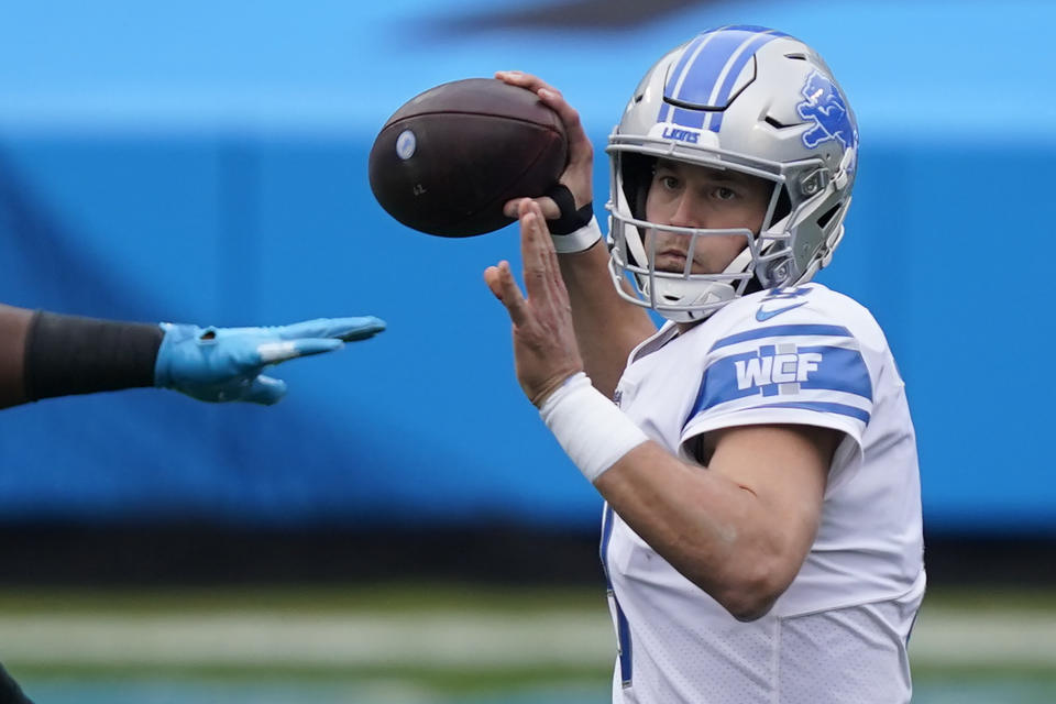 Detroit Lions quarterback Matthew Stafford passes against the against the Carolina Panthers during the first half of an NFL football game Sunday, Nov. 22, 2020, in Charlotte, N.C. (AP Photo/Gerry Broome)