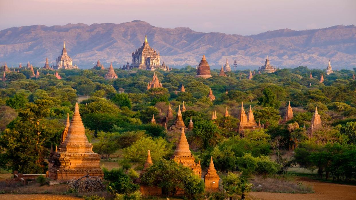 Sunrise landscape view with silhouettes of old temples, Bagan, Myanmar (Burma).