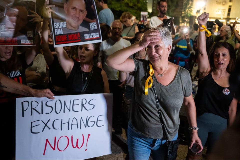 A relative of a hostage reacts during a rally calling for hostages to be released in the Tel Aviv (Getty Images)