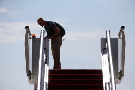 Security personnel inspects aircraft stairs before the arrival of U.S. President Barack Obama (not pictured) at Hangzhou Xiaoshan international airport before the G20 Summit in Hangzhou, Zhejiang province, China September 3, 2016. REUTERS/Damir Sagolj