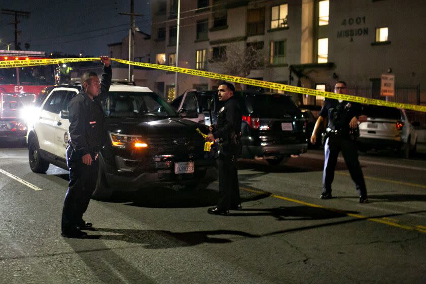 LOS ANGELES, CA - MARCH 08: LAPD officers secure the scene where 3 LAPD officers were shot in Lincoln Heights on Wednesday, March 8, 2023 in Los Angeles, CA. (Jason Armond / Los Angeles Times)