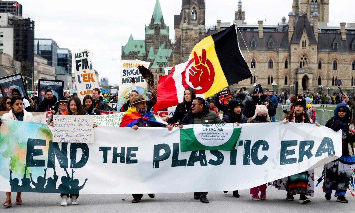 <span>People take part in an anti-plastic demonstration in Ottawa, Canada, where negotiations are taking place over a future legally binding treaty to cut pollution.</span><span>Photograph: Spencer Colby/AP</span>