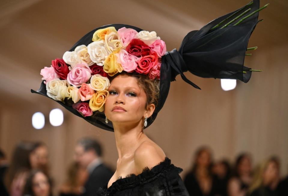 The floral headpiece was a vintage accessory by Philip Treacy from the Alexander McQueen 2007 collection. AFP via Getty Images