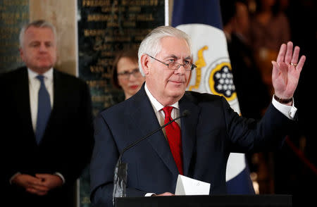 Outgoing U.S. Secretary of State Rex Tillerson waves to employees upon his departure from the State Department in Washington, U.S., March 22, 2018. REUTERS/Kevin Lamarque