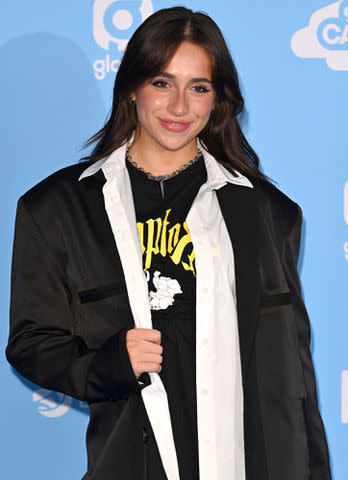 <p>Karwai Tang/WireImage</p> Tate McRae walks the media line during Capital FM's Summertime Ball at Wembley Stadium on June 12, 2022 in London, England.