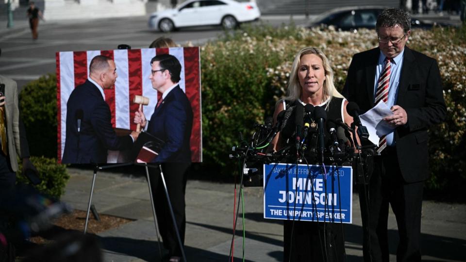 PHOTO: Marjorie Taylor Greene (2nd R) and Thomas Massie (R) hold a press conference  outside the US Capitol in Washington, DC, on May 1, 2024. (Brendan Smialowski/AFP via Getty Images)