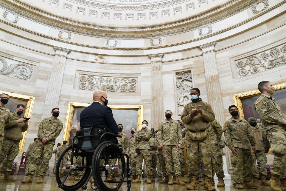 Rep. Brian Mast, R-Fla., gives troops a tour in the Rotunda on Capitol Hill in Washington, Wednesday, Jan. 13, 2021. (AP Photo/Susan Walsh)