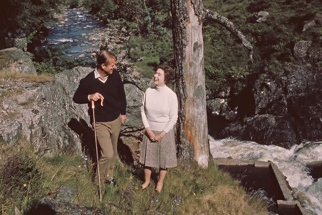 <p>Central Press/Hulton Archive/Getty</p> Queen Elizabeth and Prince Philip at Balmoral in 1972.