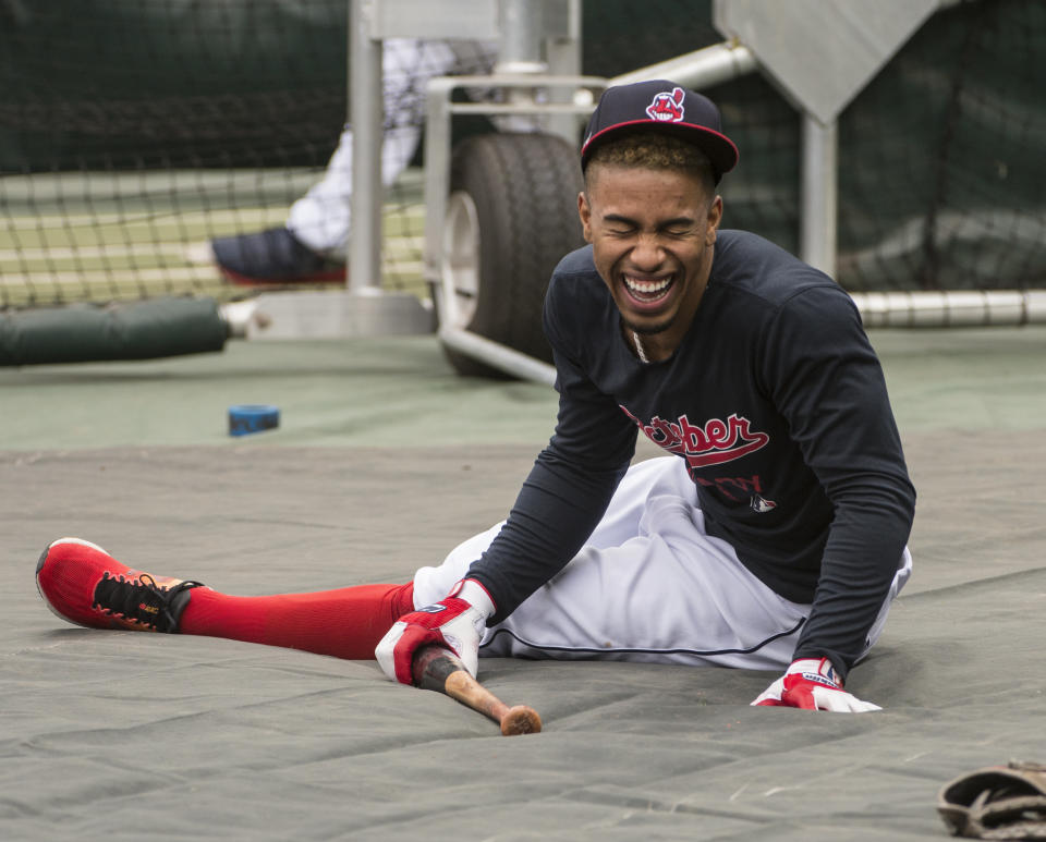 Cleveland Indians' Francisco Lindor laughs during a workout in Cleveland, Sunday, Oct. 7, 2018. The Indians play the Houston Astros in the third game of their ALDS series Monday. (AP Photo/Phil Long)