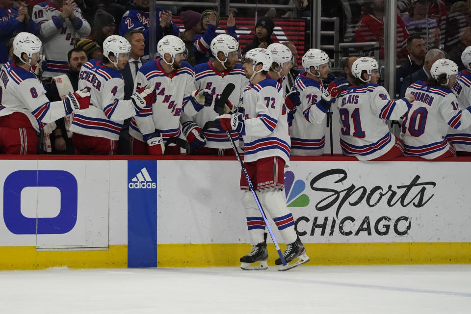 New York Rangers center Filip Chytil (72) celebrates after his goal against the Chicago Blackhawks during the first period of an NHL hockey game Sunday, Dec. 18, 2022, in Chicago. (AP Photo/David Banks)