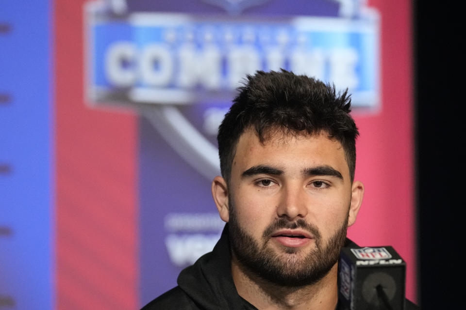 North Carolina quarterback Sam Howell speaks during a press conference at the NFL football scouting combine, Wednesday, March 2, 2022, in Indianapolis. (AP Photo/Darron Cummings)