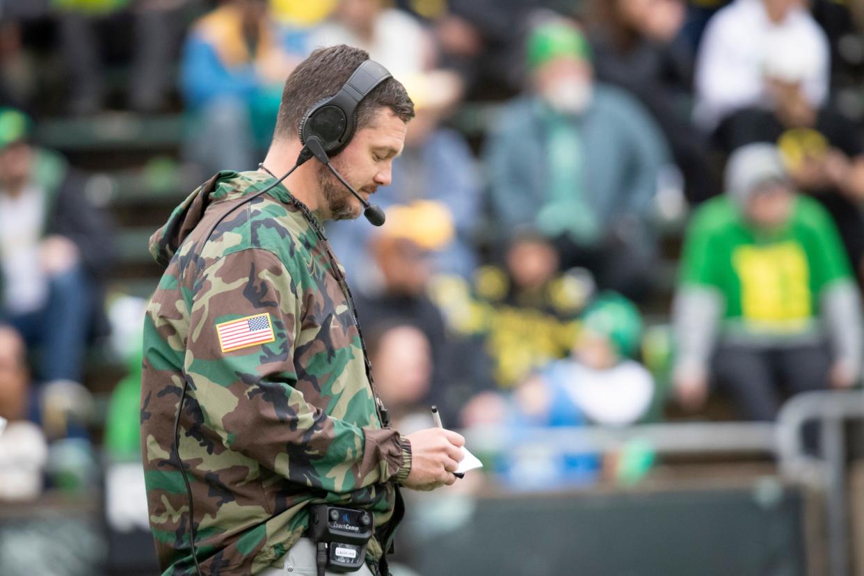 Oregon head coach Dan Lanning takes notes during the Oregon Ducks’ spring game Saturday, April 27, 2024 at Autzen Stadium in Eugene, Ore.