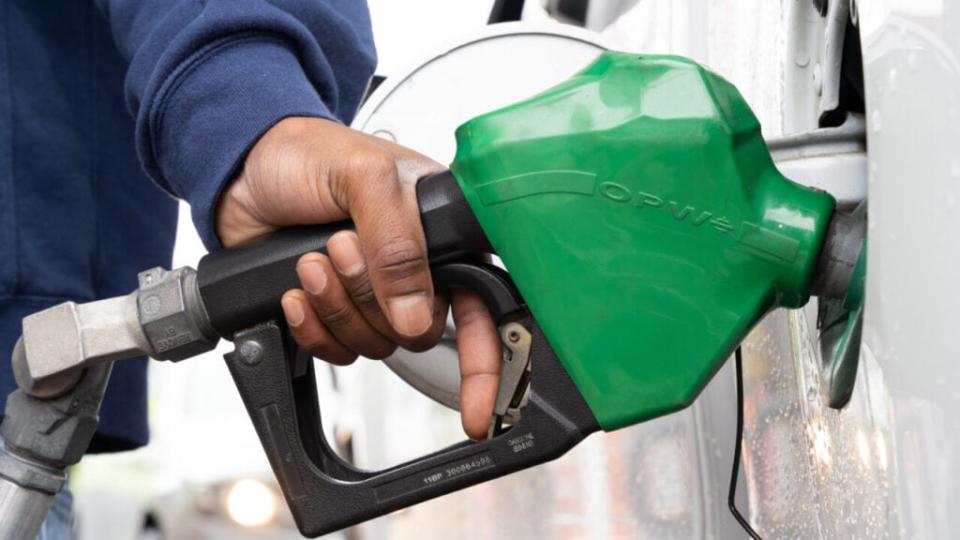 A man refuels at a gas station on May 12, 2021 in Fayetteville, North Carolina. Most stations in the area along I-95 are without fuel following the Colonial Pipeline hack. (Photo by Sean Rayford/Getty Images)