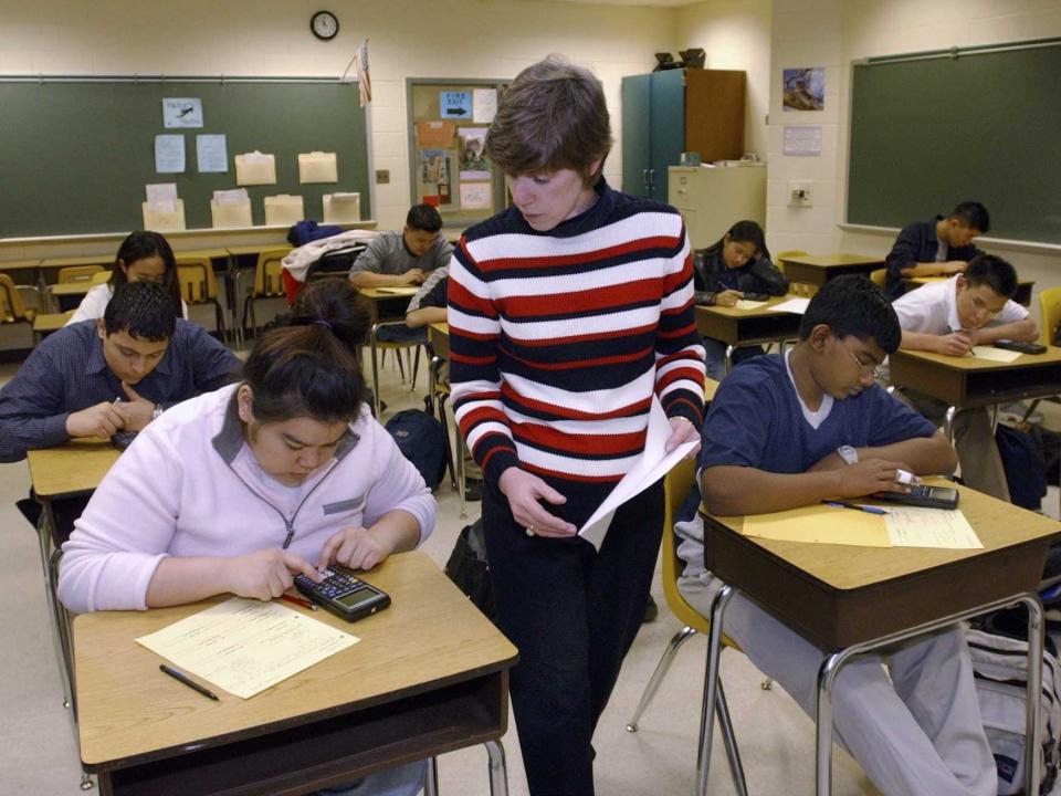 Students Taking Test Teacher