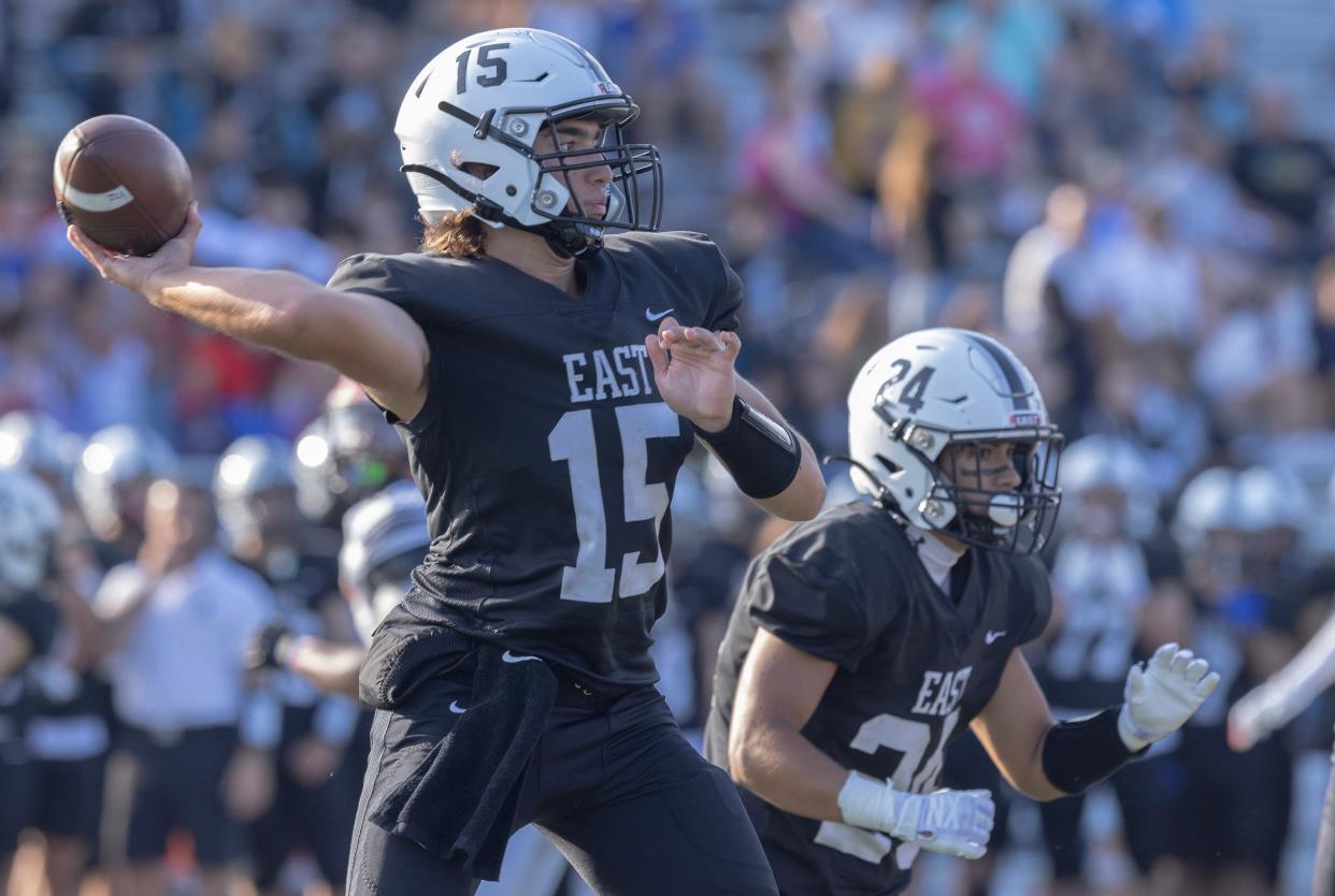 East quarterback Anthony DeMarco throws a pass in early action. Toms River East football beats Barnegat in season opener in Toms River on August 29, 2024.