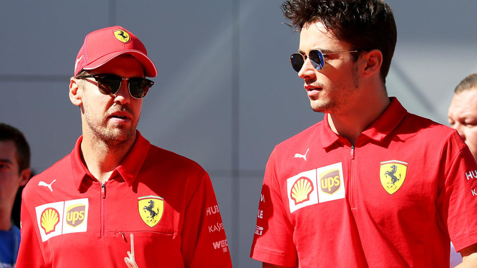 Sebastian Vettel, pictured here speaking with Charles Leclerc.