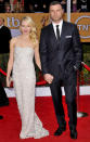<b>Naomi Watts and Liev Schreiber</b><br><br> This is not a good look in terms of body language compatibility with only one of them looking as though they are really enjoying the red carpet thing. Naomi’s perfect smile suggests she’s in her element. Her legs are crossed away from Liev, suggesting she’s keen to move on while his legs are well planted, making him look as though movement is not currently an option. His camera stare lacks the warmth of a smile and his hand in one pocket could signal an inner desire to hide.<br><br> <b>Why it works:</b> The cliché goes that opposites attract, which could be a good thing if you judge these two on their body language signals. <br><br>Image: REX