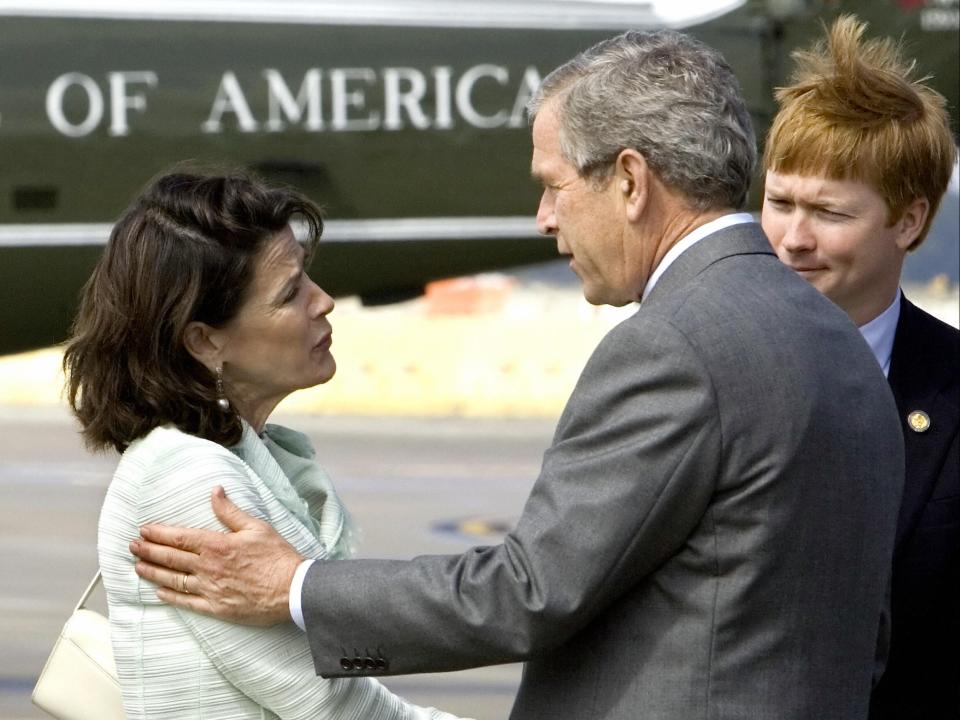 <p>Katherine Harris and George Bush, pictured in May 2006</p>AFP via Getty Images