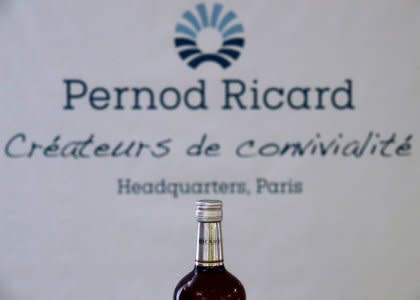 FILE PHOTO: A logo is seen on a bottle of the Ricard aniseed-flavoured beverage displayed during French drinks maker Pernod Ricard news conference to announce the company annual results in Paris, France, August 29, 2018.   REUTERS/Christian Hartmann