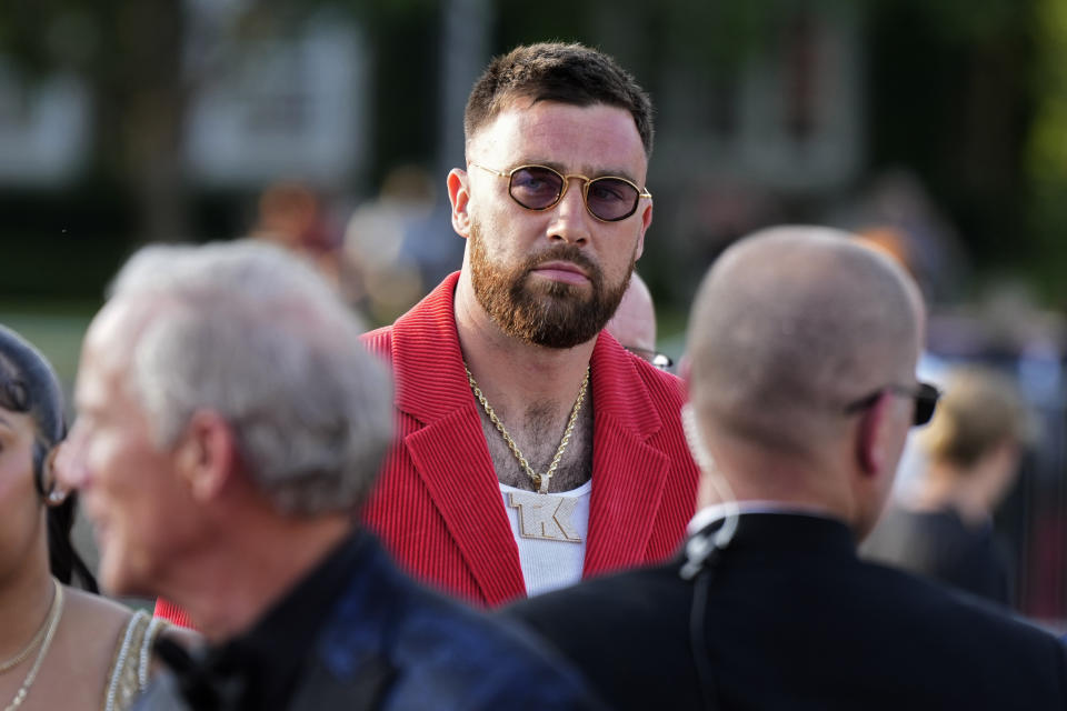 Kansas City Chiefs tight end Travis Kelce arrives at the The Nelson-Atkins Museum of Art for a ceremony for team members to receive their championship rings for winning NFL's Super Bowl 58 football game Thursday, June 13, 2024, in Kansas City, Mo. (AP Photo/Charlie Riedel)