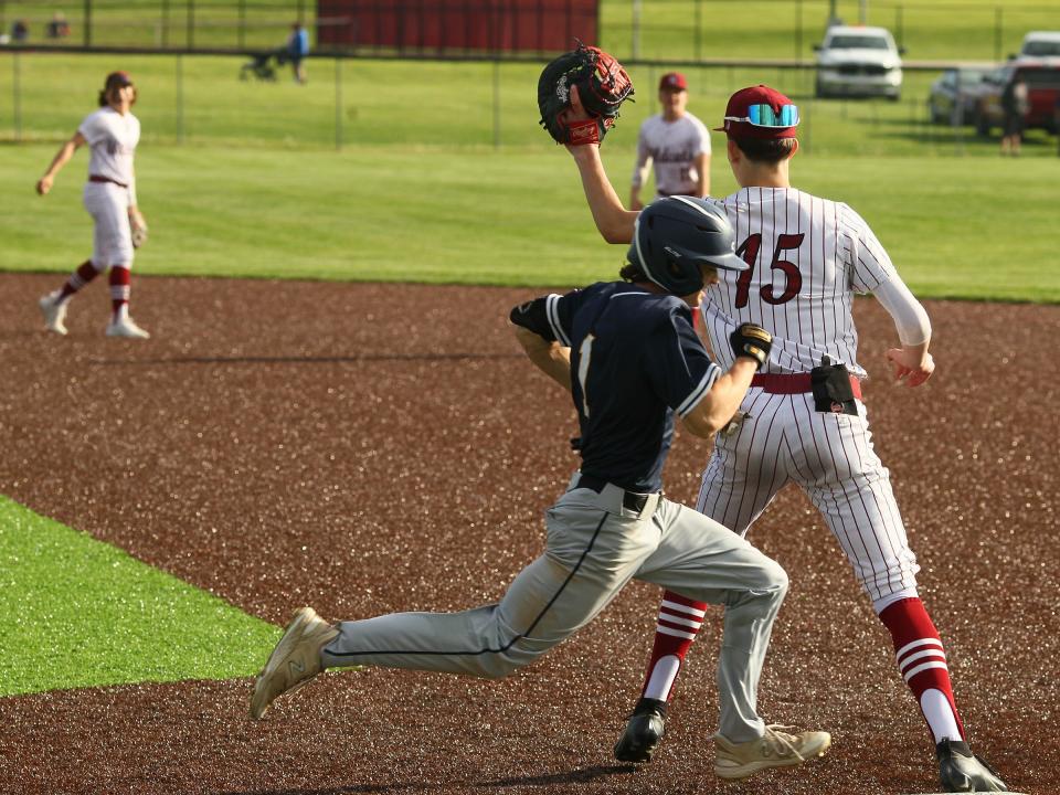 Lancaster's Aiden Henson beats out an infield hit during the 2-0 win against Newark.