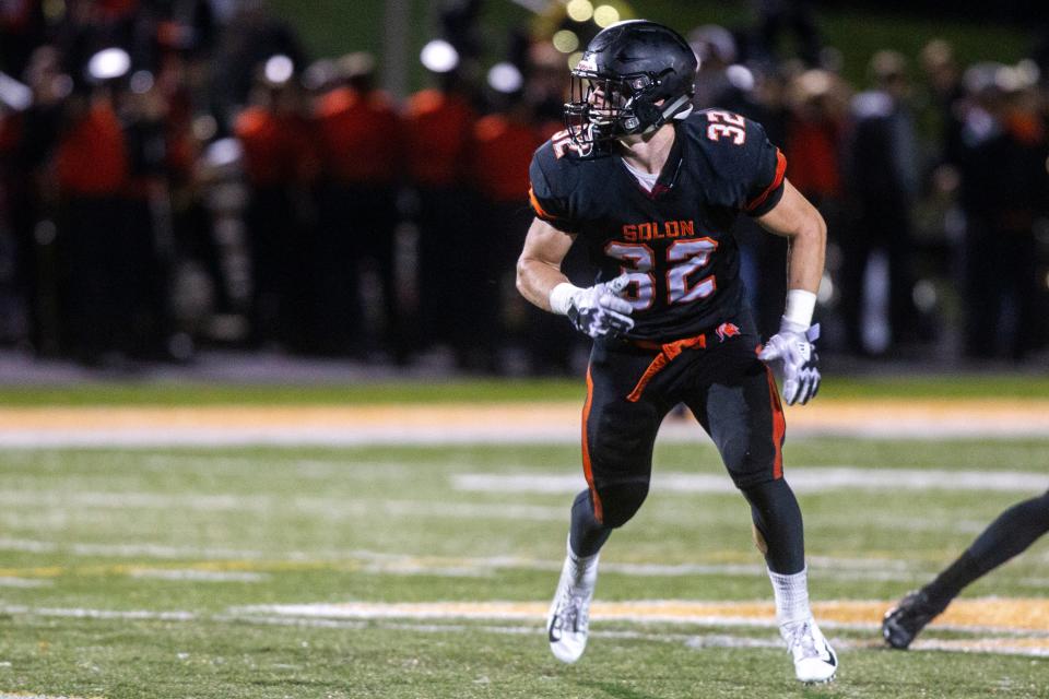 Solon's Adam Bock (32) follows a play during a Class 3A varsity football game on Friday, Sept. 28, 2018, at Spartan Stadium in Solon, Iowa.