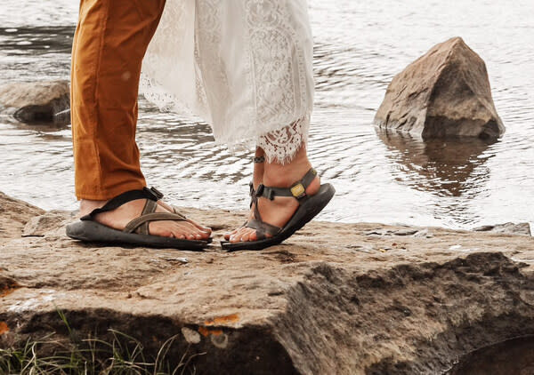 Chaco shoes photographed on beach for 35th anniversary wedding event announcement