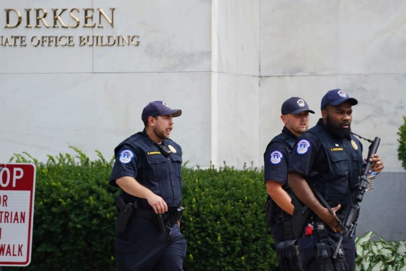 Police search near the Russell Senate Office Building in Washington, D.C., after reports of a possible active shooter Wednesday. Photo by Bonnie Cash/UPI