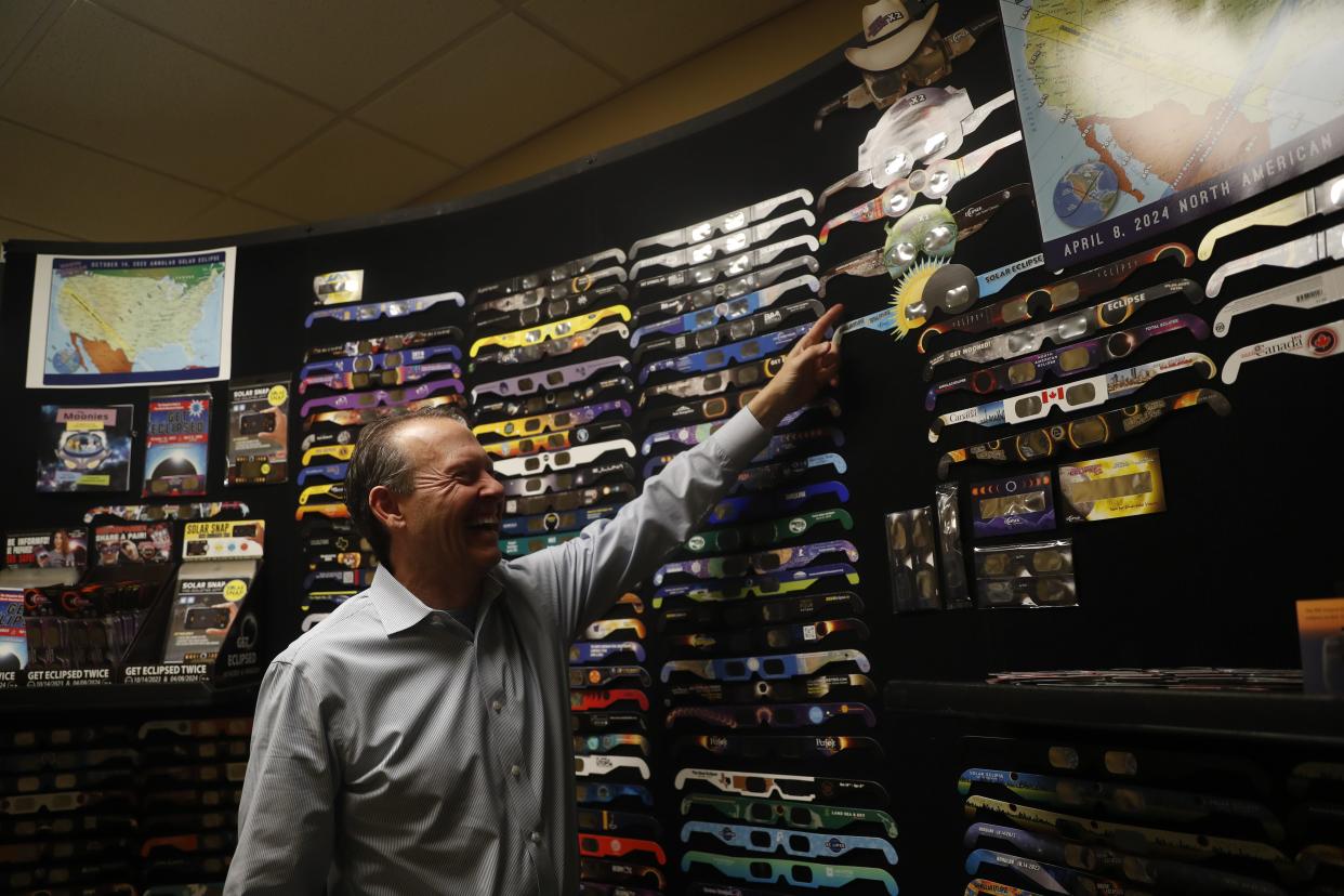 President of American Paper Optics, John Merit points at his favorite pair American Paper Optics in Memphis, Tennessee has produced.