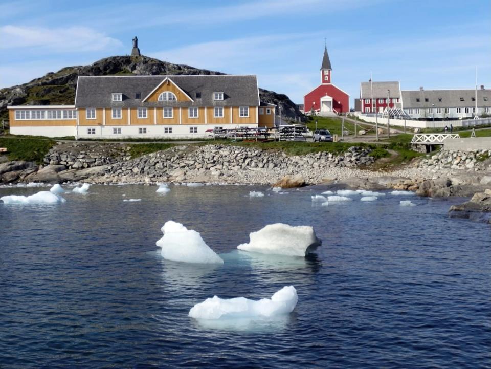 Nuuk, Greenland's capital, is a small city on the southwest coast. The city's fjord system is known for its icebergs, humpback whale watching and waterfalls. Nuuk has a population of over 17,000 people. 