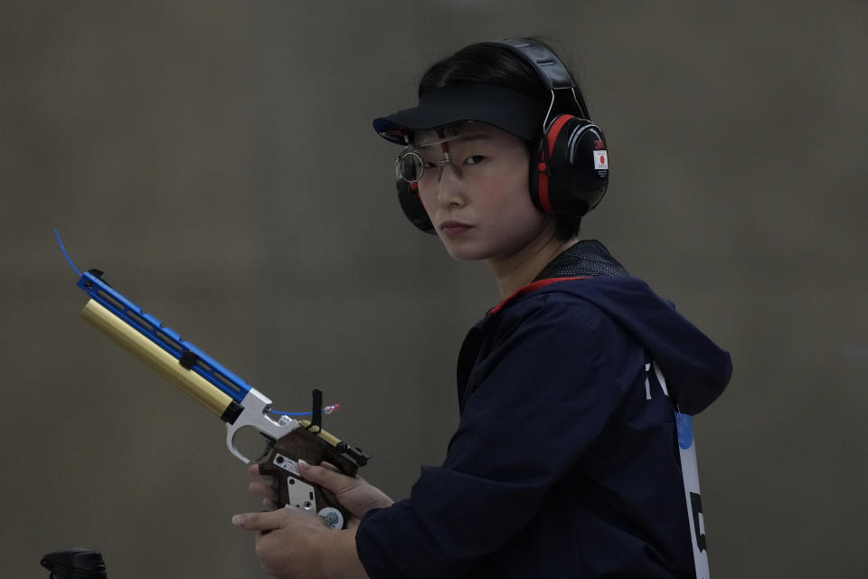 Japan's Satoko Yamada prepares to compete during the Shooting 10m Air Pistol Mixed Team bronze medal match against South Korea for the 19th Asian Games in Hangzhou, China, Saturday, Sept. 30, 2023. (AP Photo/Ng Han Guan)