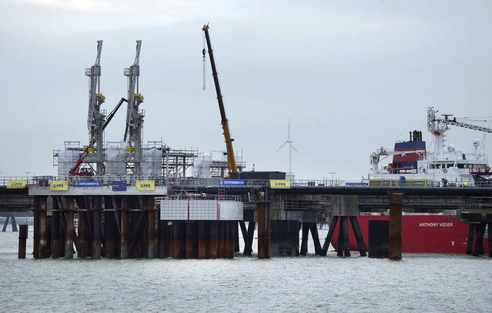 The LPG tanker 'Coral Parensis' is anchored at the construction site of the 'Uniper' LNG (Liquefied Natural Gas) terminal in Wilhelmshaven, Germany, Tuesday, Nov. 15, 2022. (AP Photo/Michael Sohn)