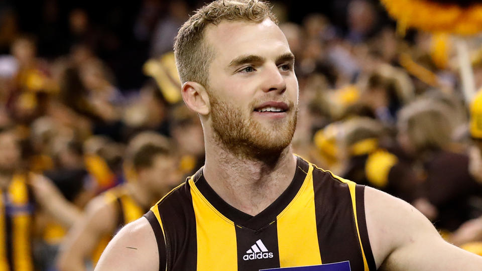 Tom Mitchell, pictured after an AFL game in 2018, has described his lengthy recovery from a horrifically broken leg.