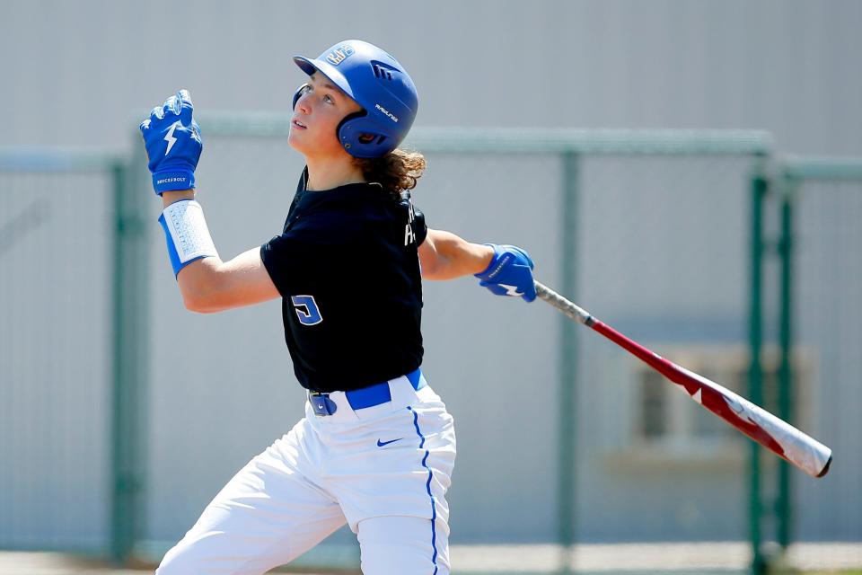 Ethan Holliday hits during before a Stillwater High School baseball game in Stillwater, Okla., Saturday, April 30, 2022.