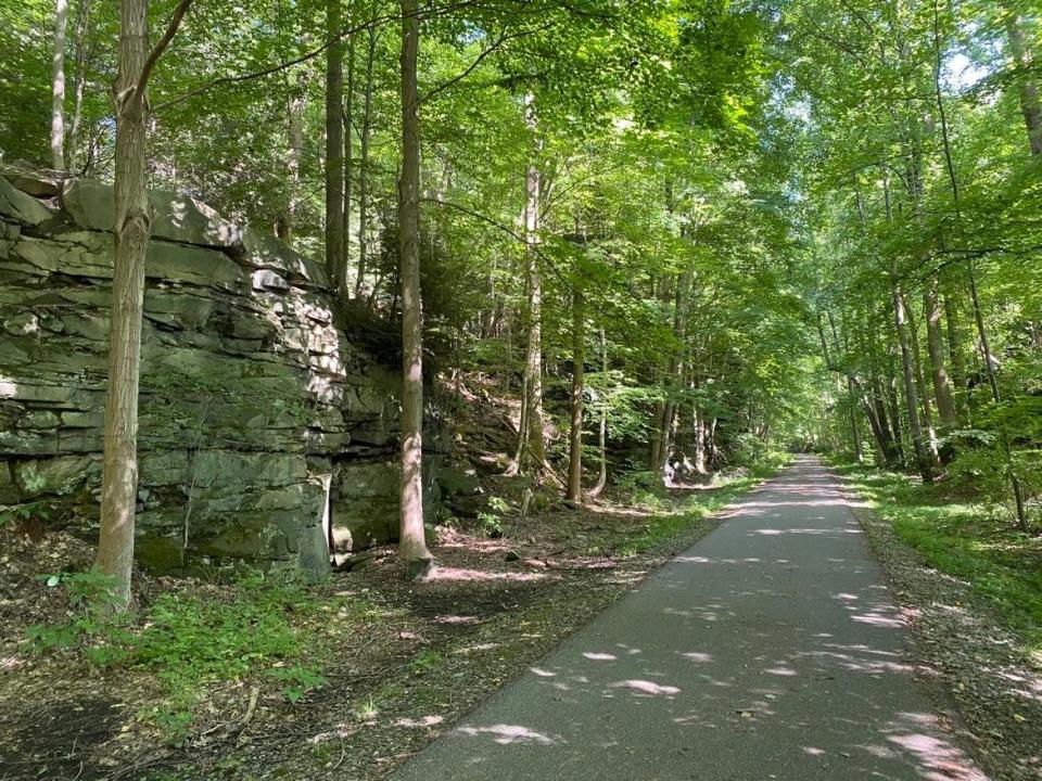 Bike trails within Cuyahoga Valley National Park offer a variety of scenery past rock formations, the Cuyahoga River and lakes and ponds.
