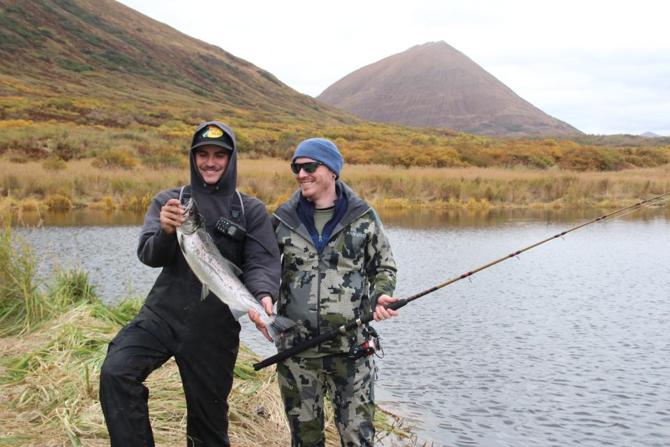 Ashton Brown of Homer Ocean Charters holds a silver salmon caught by Steve Bongard during a Oct. 1 fishing outing on Kodiak Island Alaska.